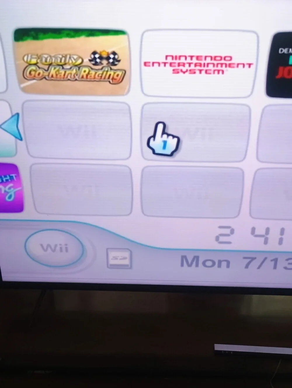 Nintendo Wii Bundle with 4 Games Black Console and White Controllers